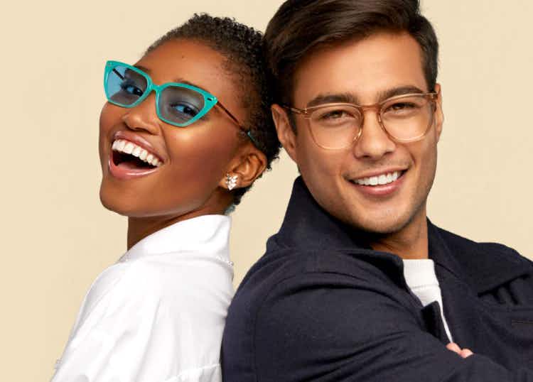 two people posing with eyebuydirect glasses