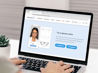 person shopping for and virtually trying on glasses online