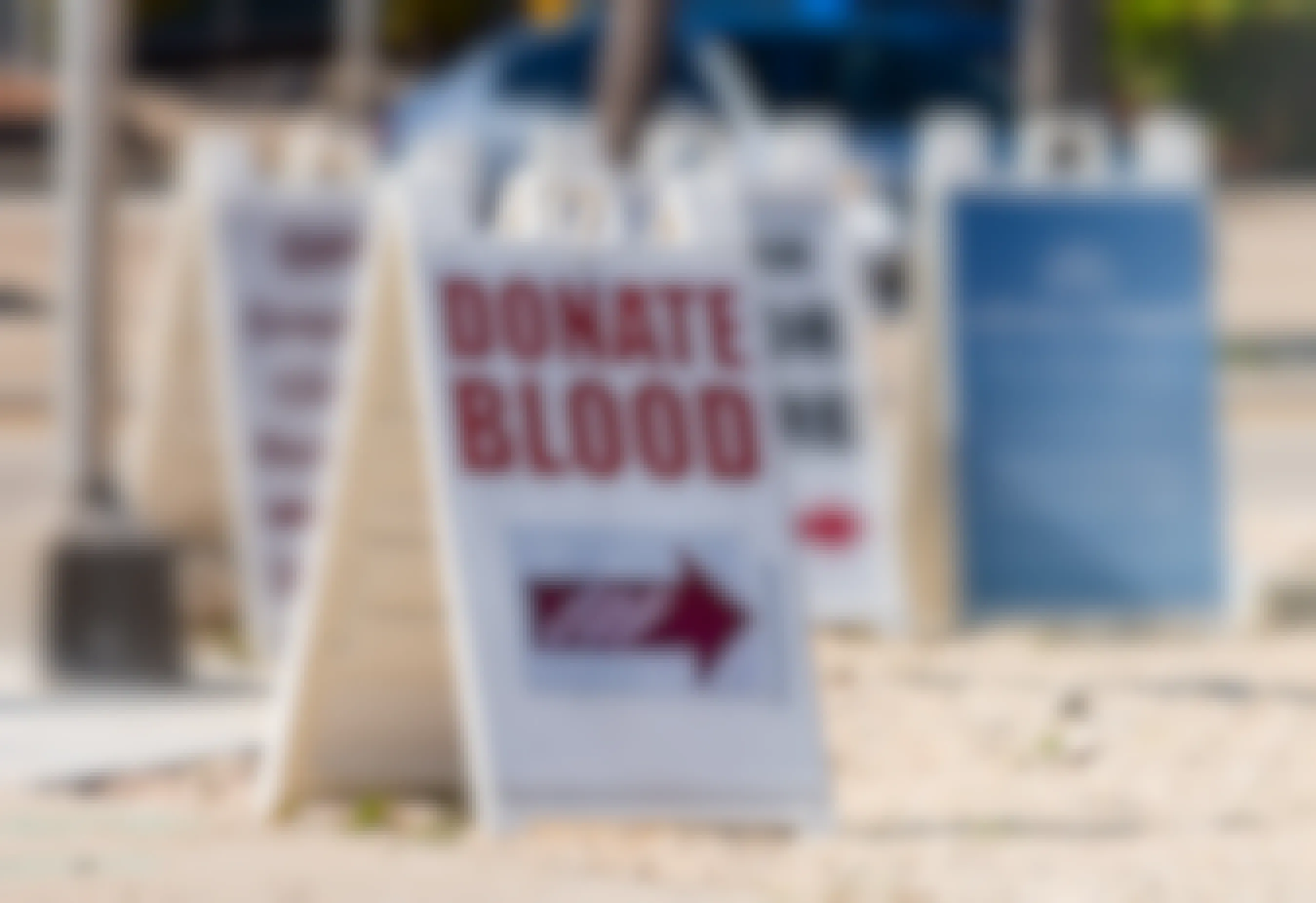Sign pointing to a blood drive