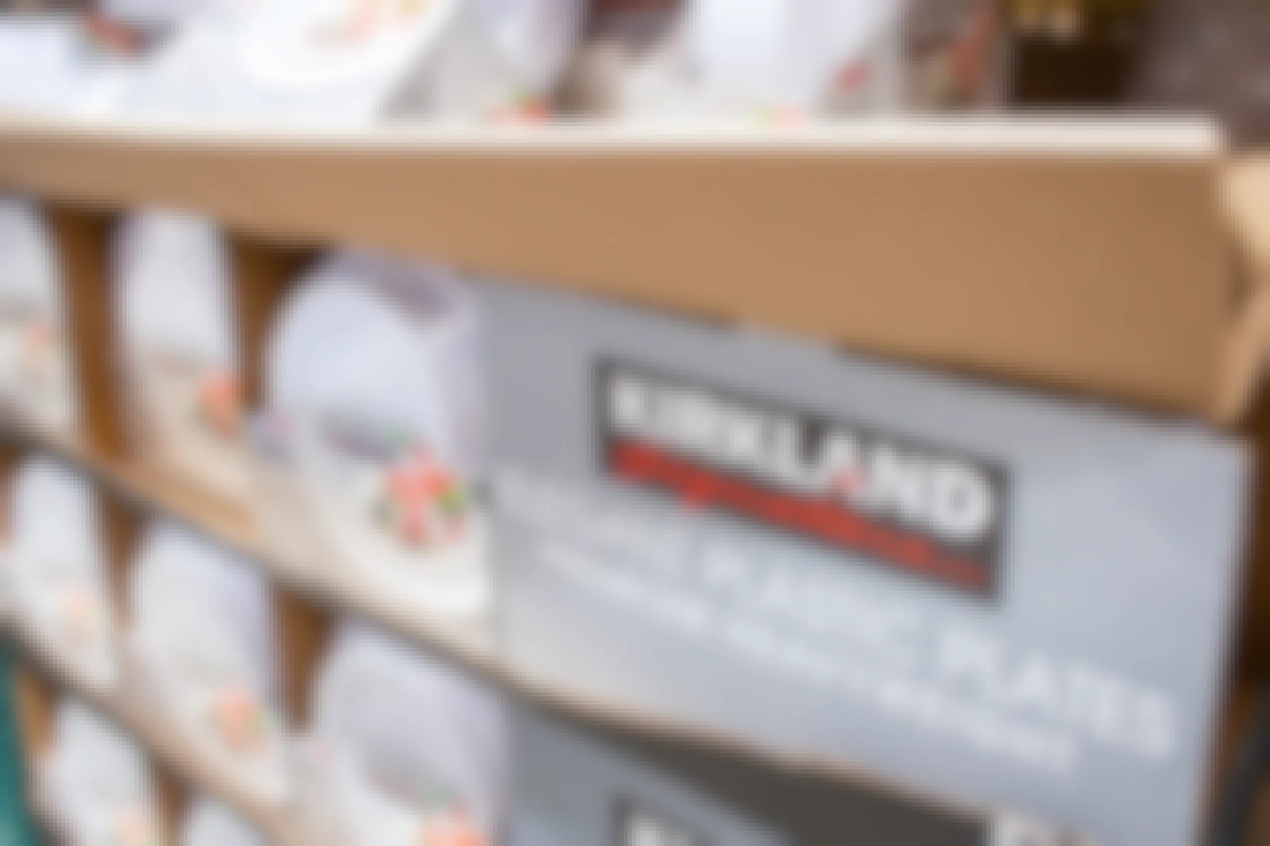 Plastic Kirkland Signature plates stocked on the sales floor