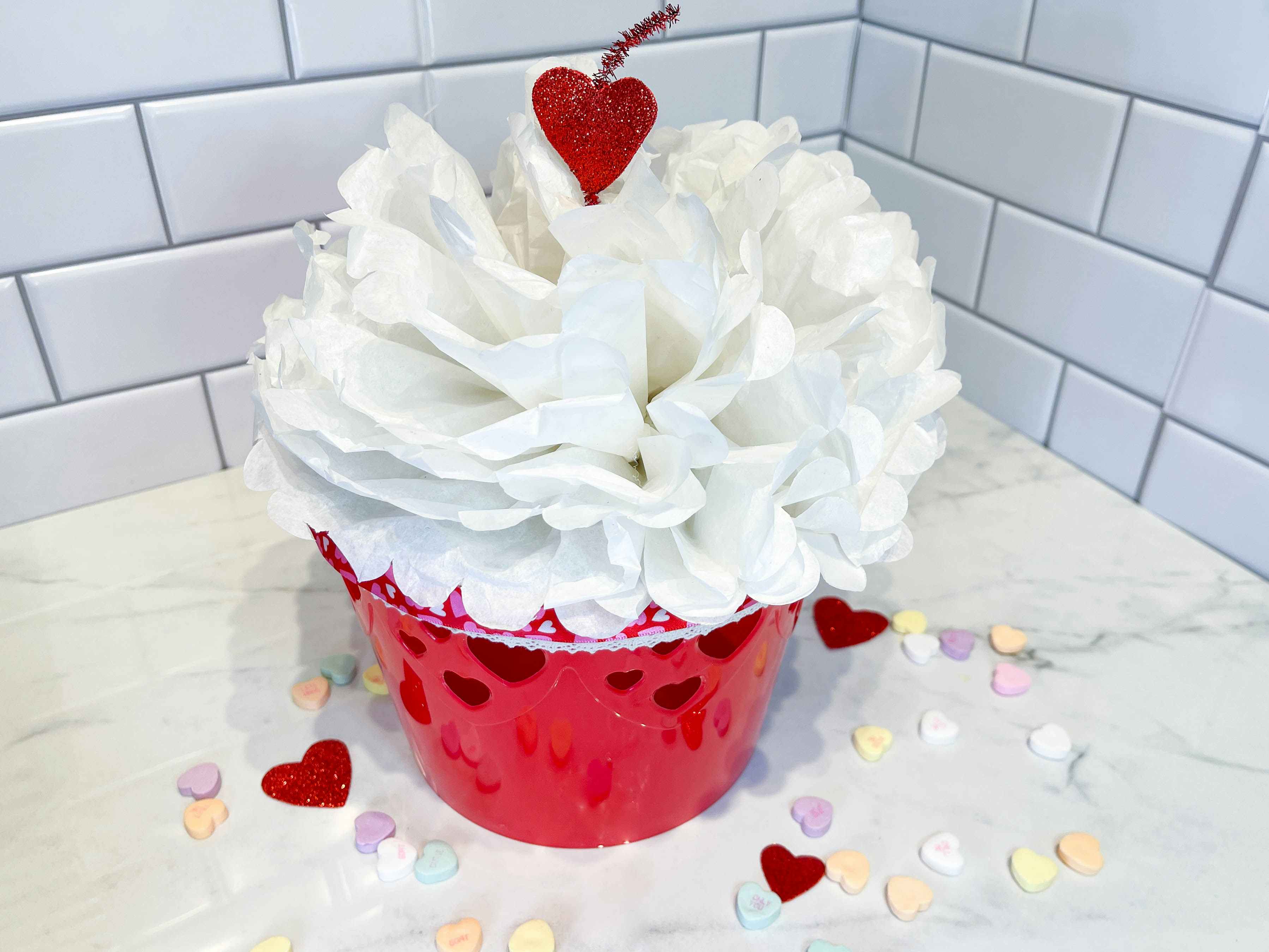 a diy cupcake valentine sitting on a counter