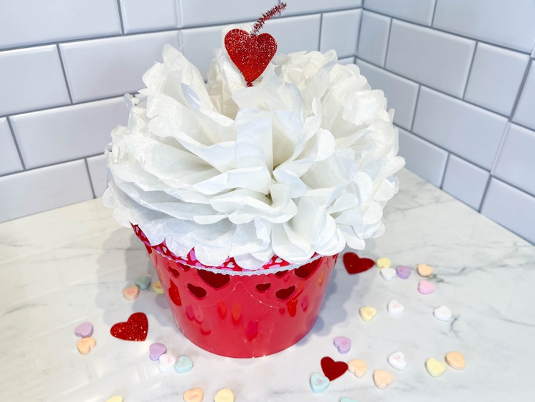 a diy cupcake valentine sitting on a counter