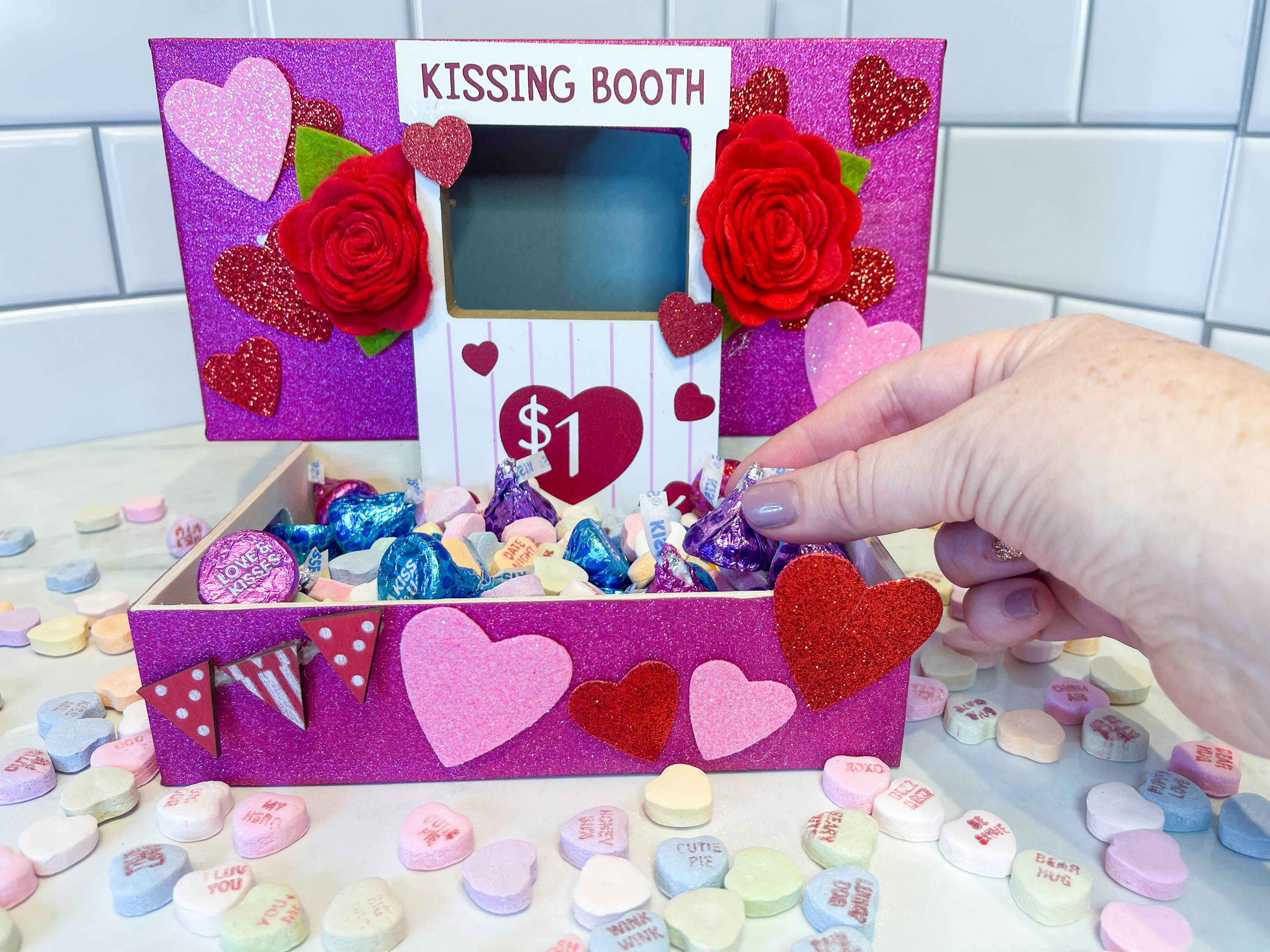 a diy kissing booth themed valentine candy box