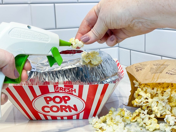 a diy popcorn valentine box being made