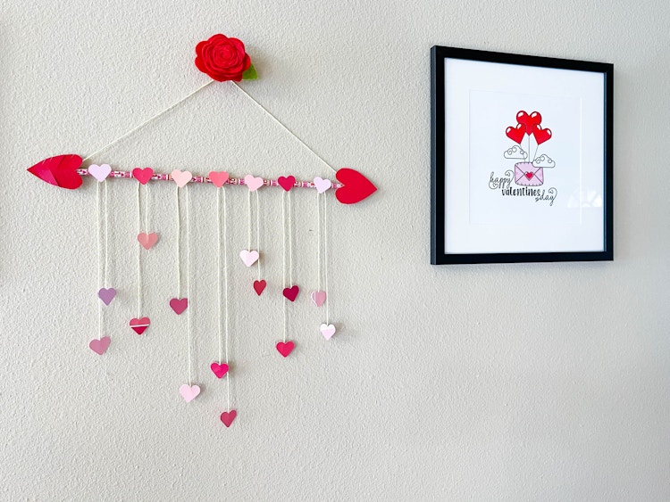 a heart wreath made from heart cut outs and pencils 