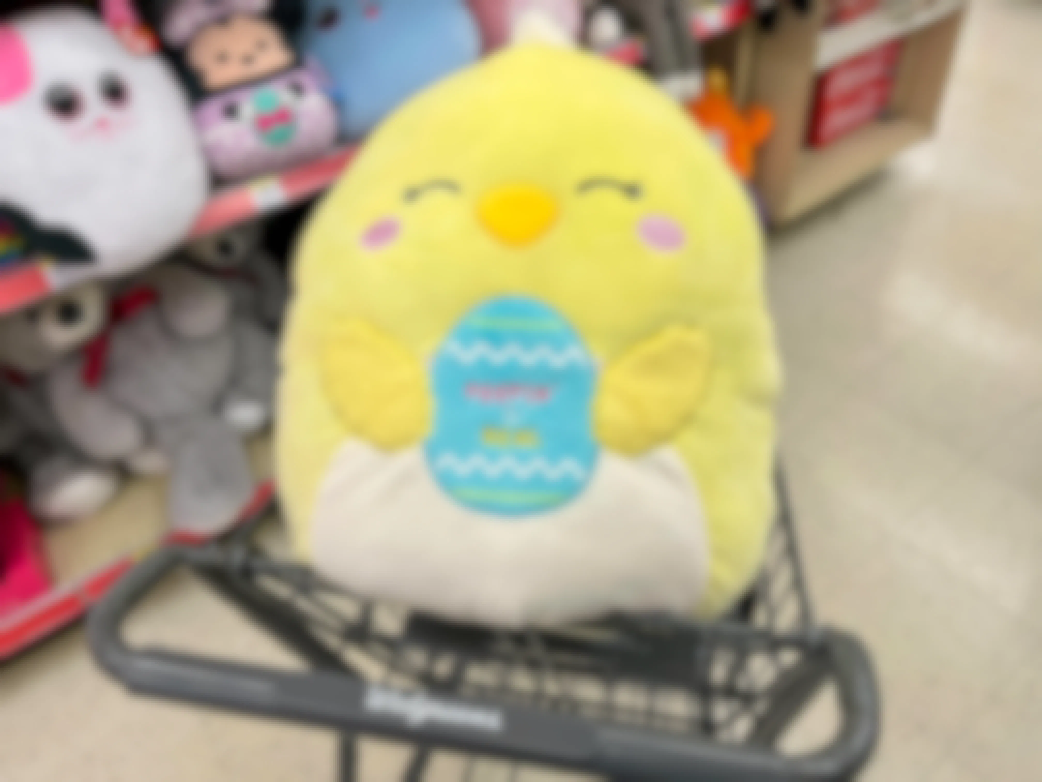 An Easter Aimee Squishmallow in a Walgreens shopping cart