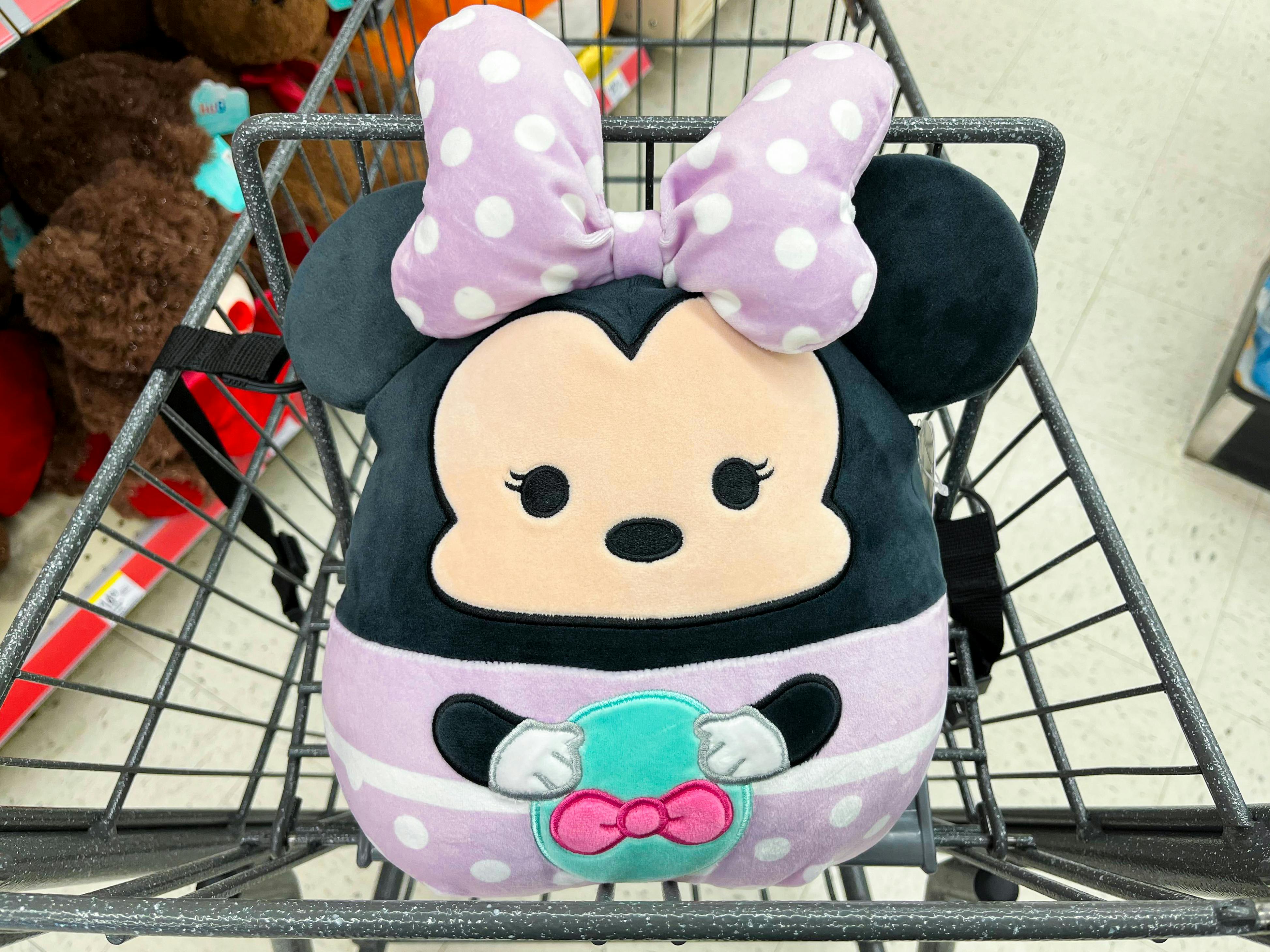 A Minnie Mouse Easter Squishmallow in a Walgreens shopping cart