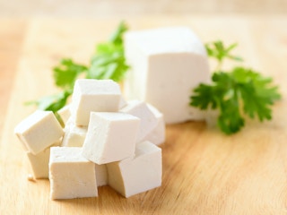 cubed tofu on cutting board