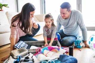 family packing suitcase travel dreamstime m 114776230 1622425399 1622425399 1673043373 1673043373