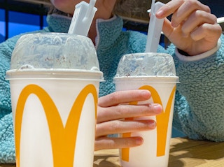 person eating mcdonalds mcflurry in restaurant