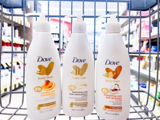 three bottles of dove love body lotion in shopping cart