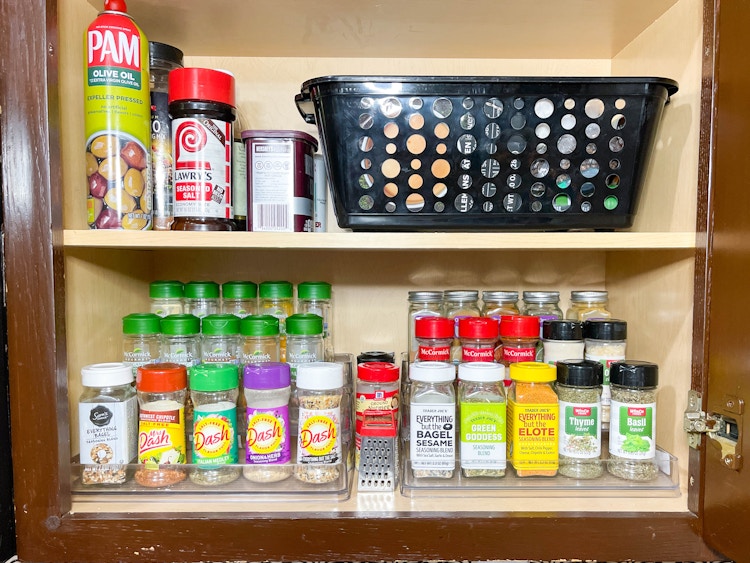 spice rack organized in a cabinet 