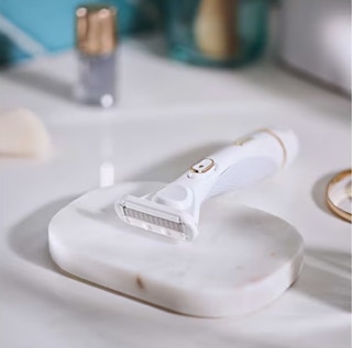 venus razor in a soap dish