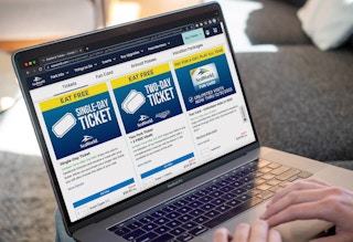 A laptop open to the Sea World ticket buying webpage