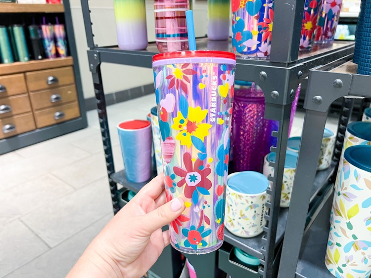 starbucks love confetti cold cup being held 
