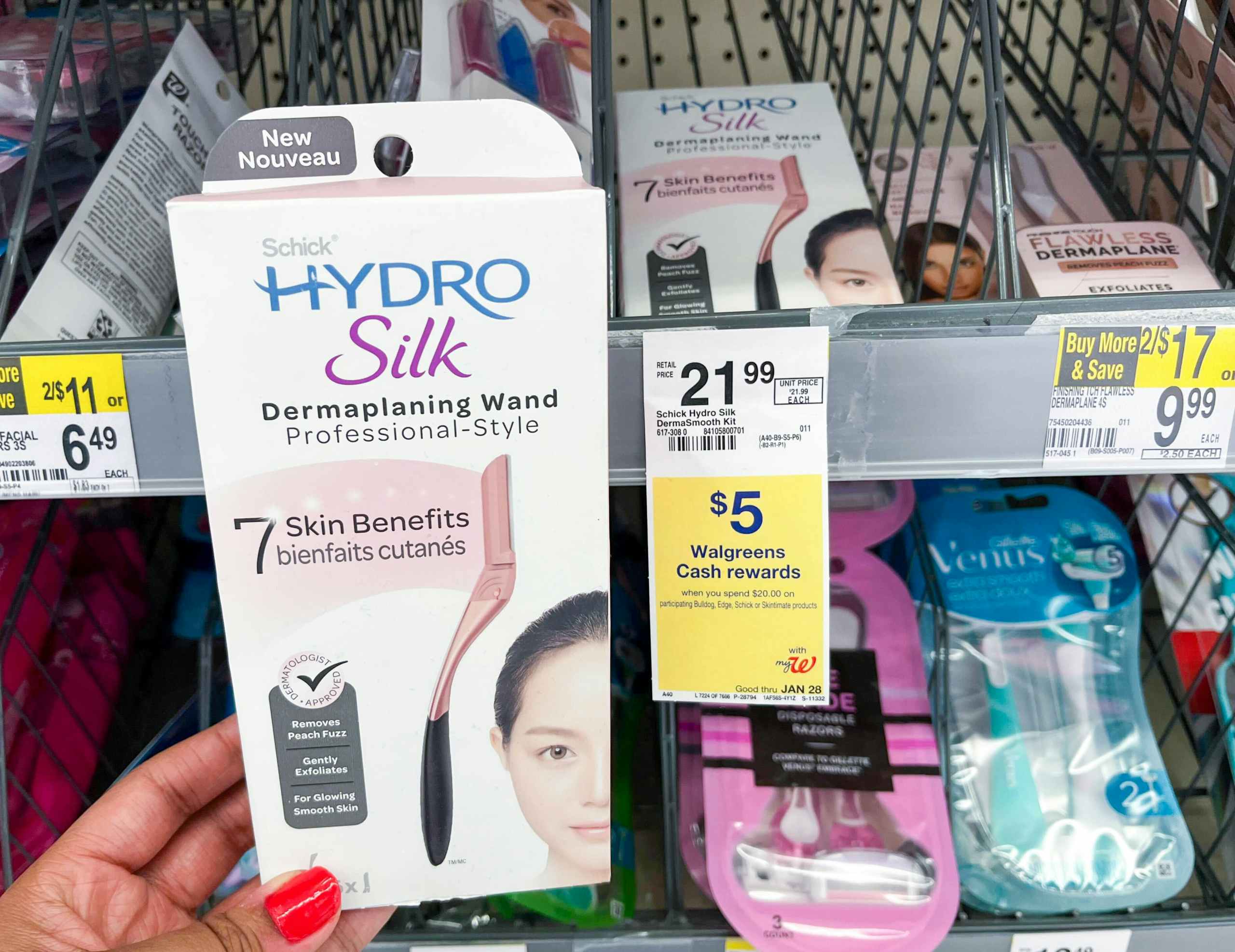 hand holding a Schick Hydro Silk dermaplanning wand box next to sales tag