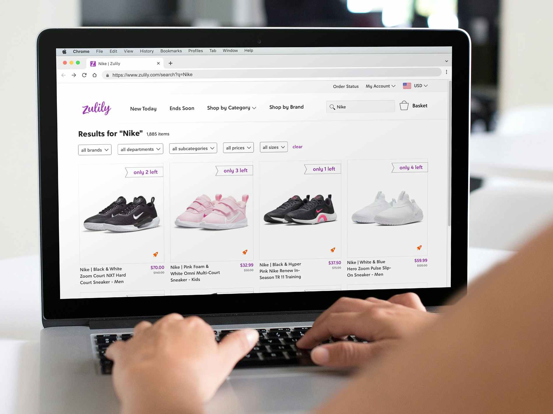 person browsing nike shoes on zulily website