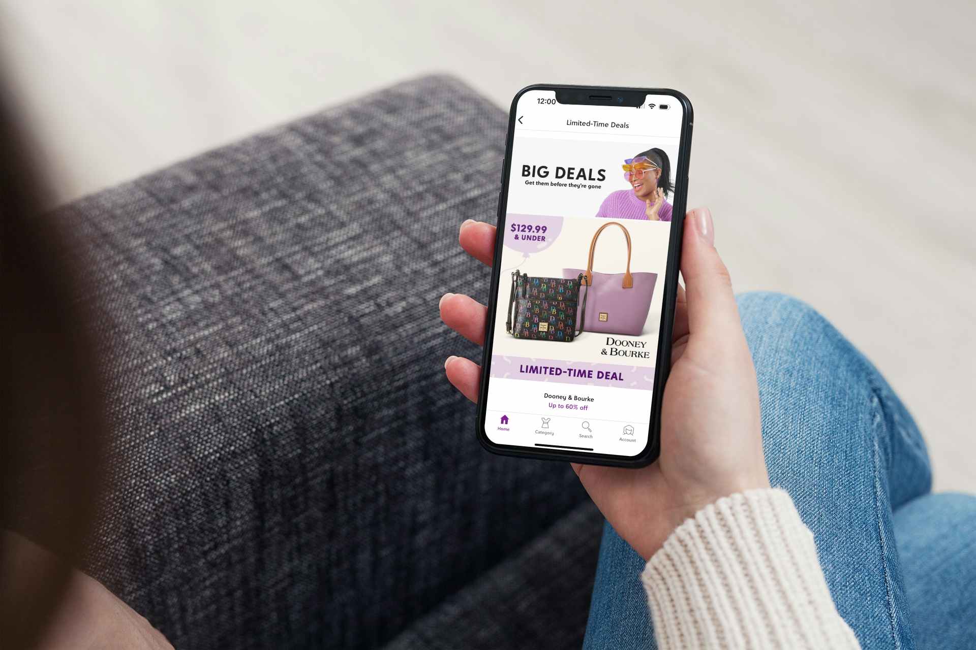 A woman looking at "Today's Deals" in the Zulily mobile app, which features a full list of the best limited-time deals available today.