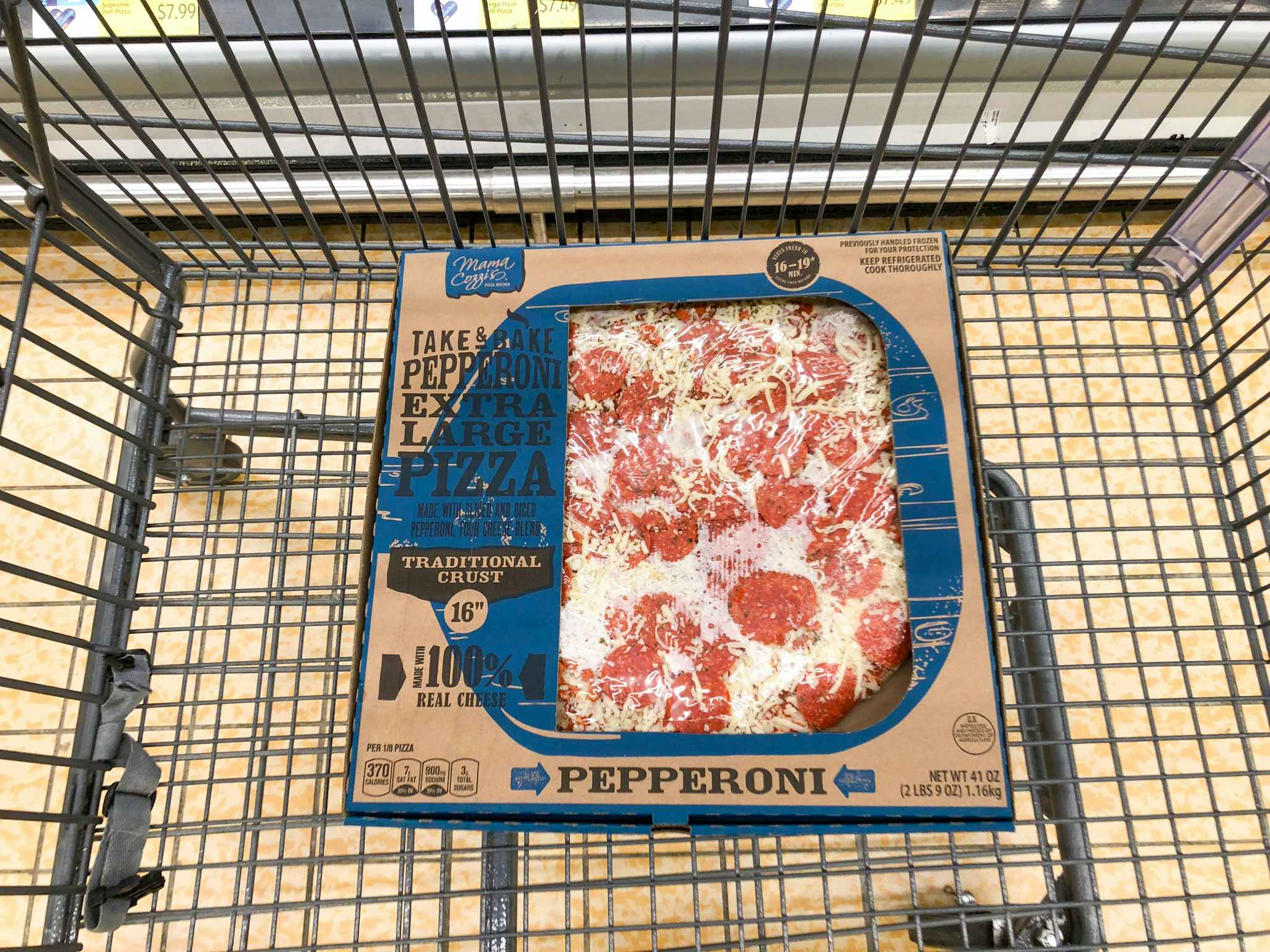a pizza in an aldi shopping cart