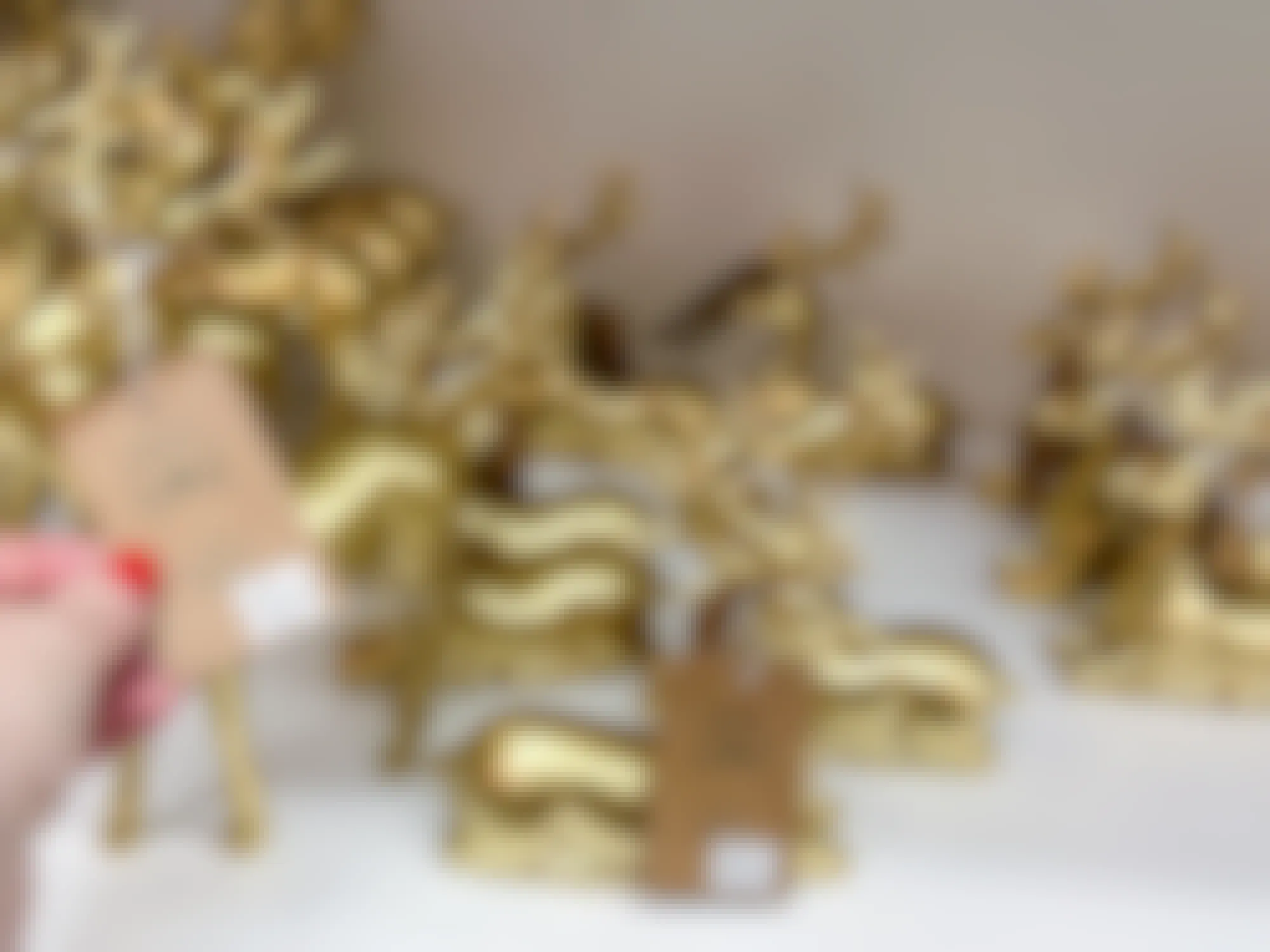 christmas gold reindeer decor clearance at closing bed bath and beyond store