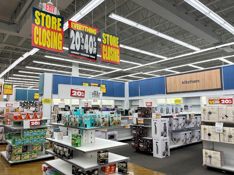 hanging store closing clearance signage in bed bath and beyond