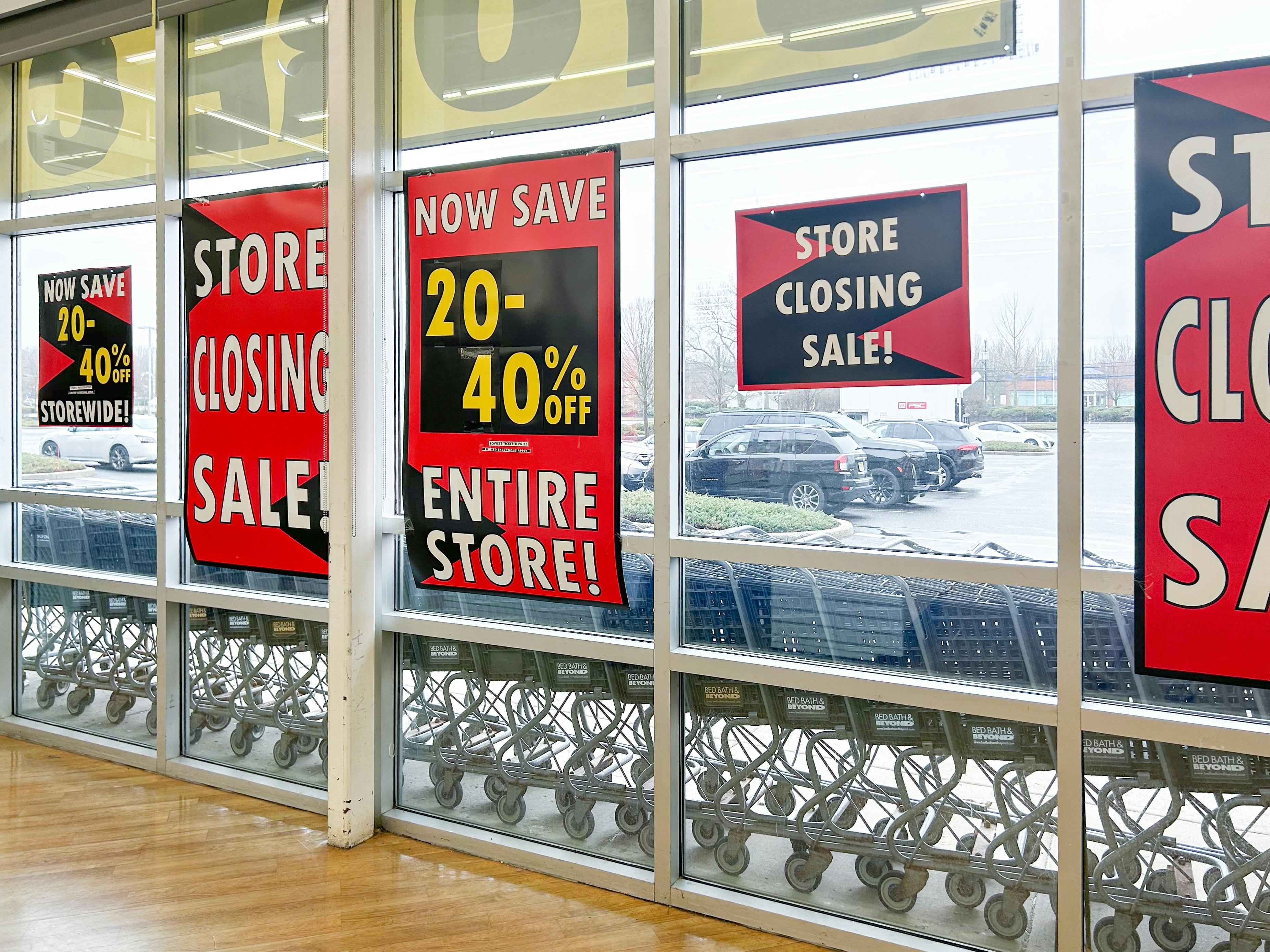 bed bath and beyond store closing interior windows with sale signage