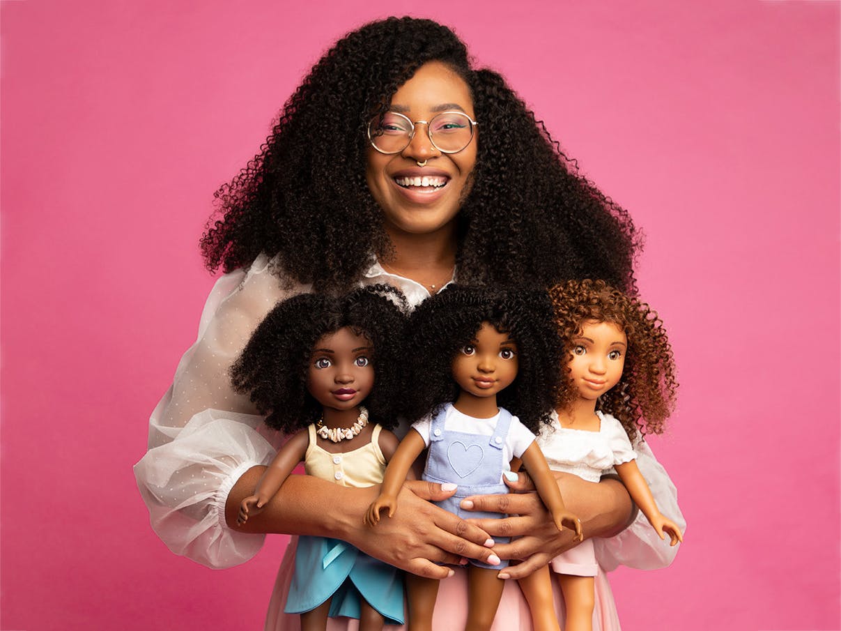 healthy roots company founder with dolls