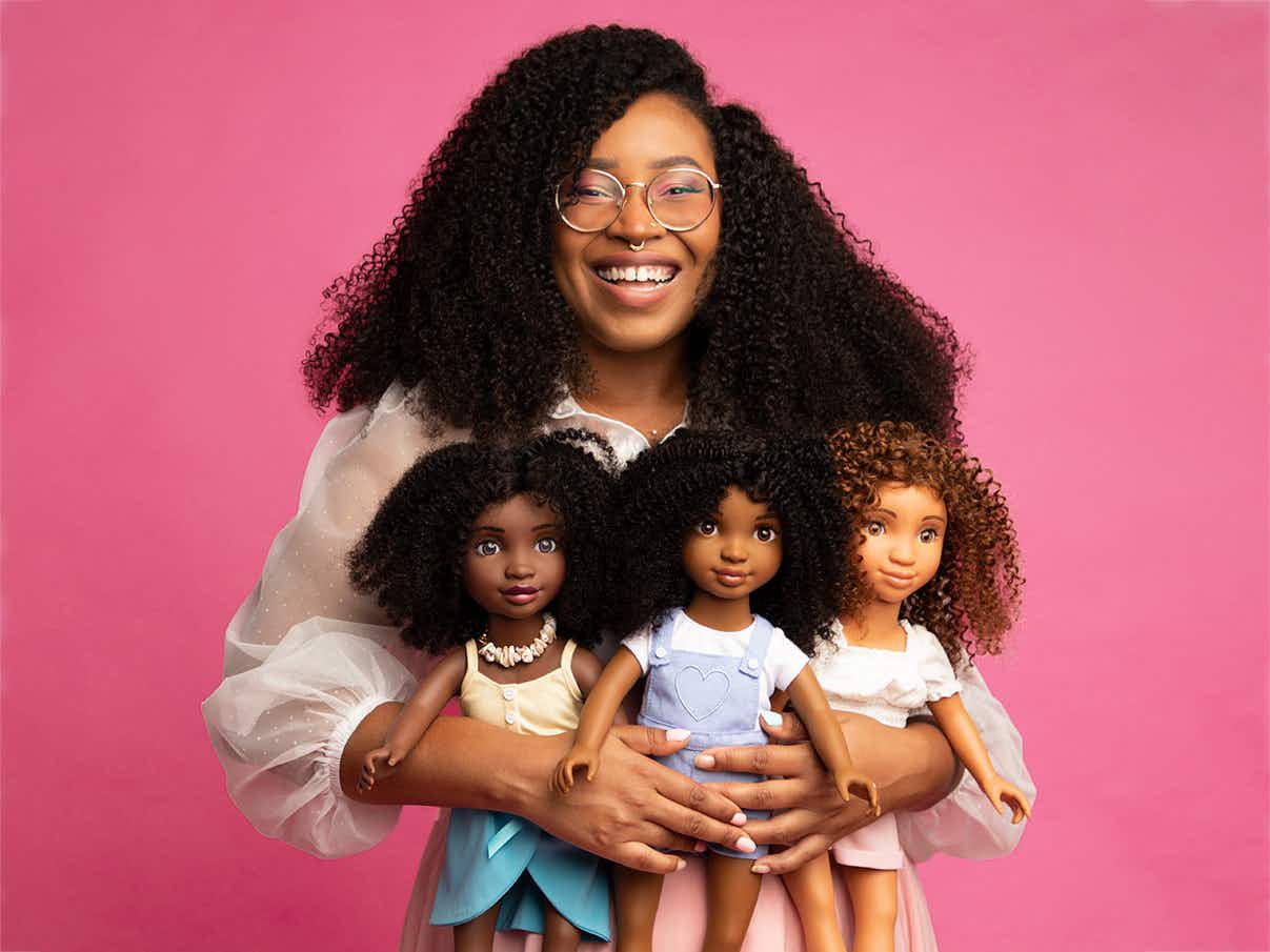 healthy roots company founder with dolls