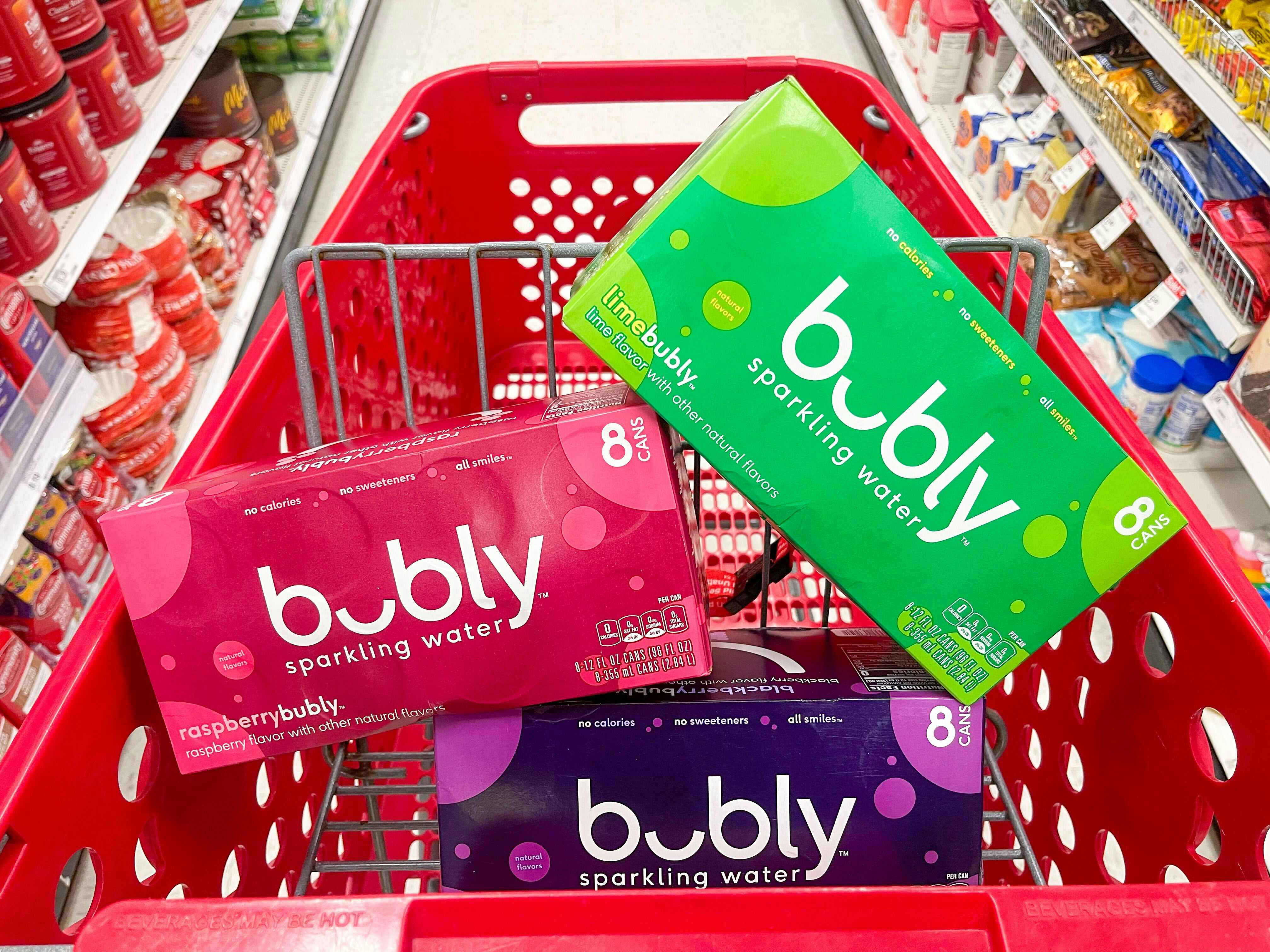 A variety of bubly sitting in a store cart.