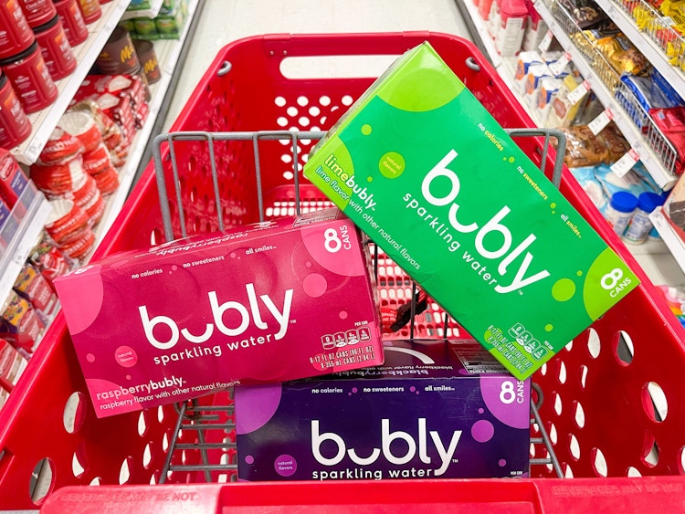 A variety of bubly sitting in a store cart.