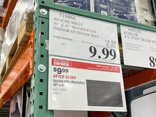 sign for 9.99 doormat