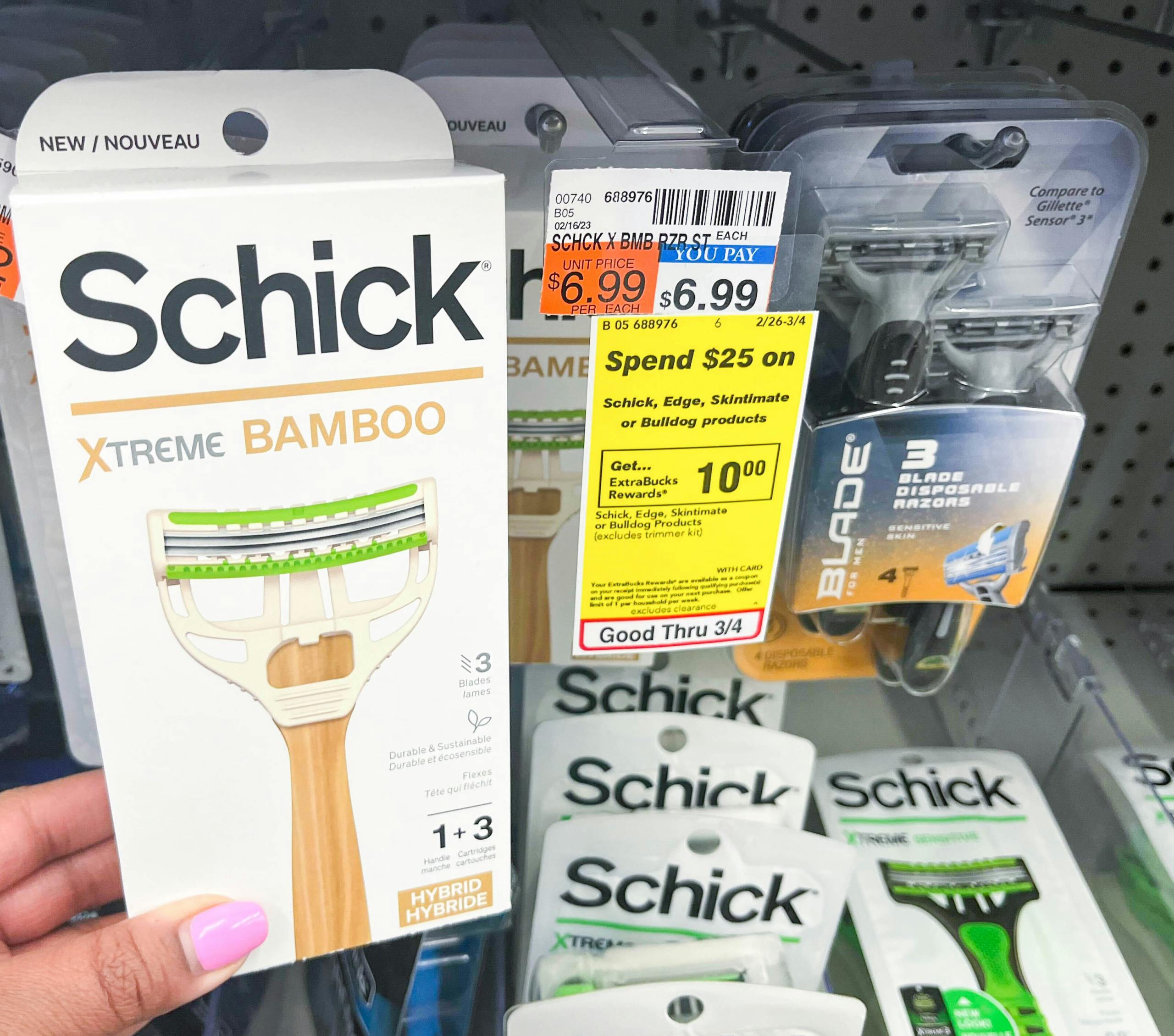 hand holding Schick Xtreme bamboo razor next to sales tag