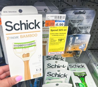 hand holding Schick Xtreme bamboo razor next to sales tag