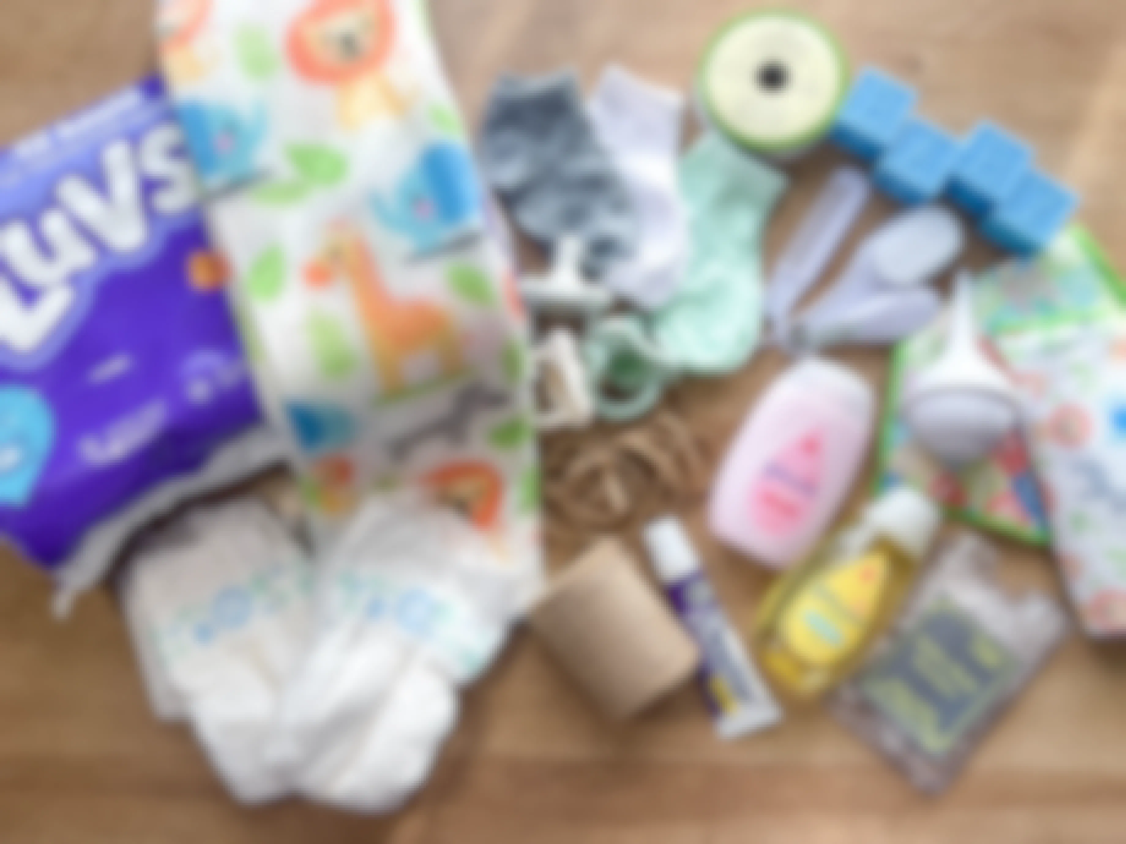 items to make a diy diaper cake sitting on a table 
