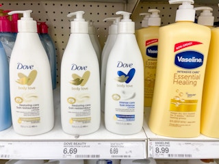 Dove Body Love Lotion sitting on a store shelf.