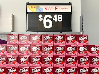 The new Dr Pepper Strawberries and Cream flavored soda on a shelf with a price sign for $6.48
