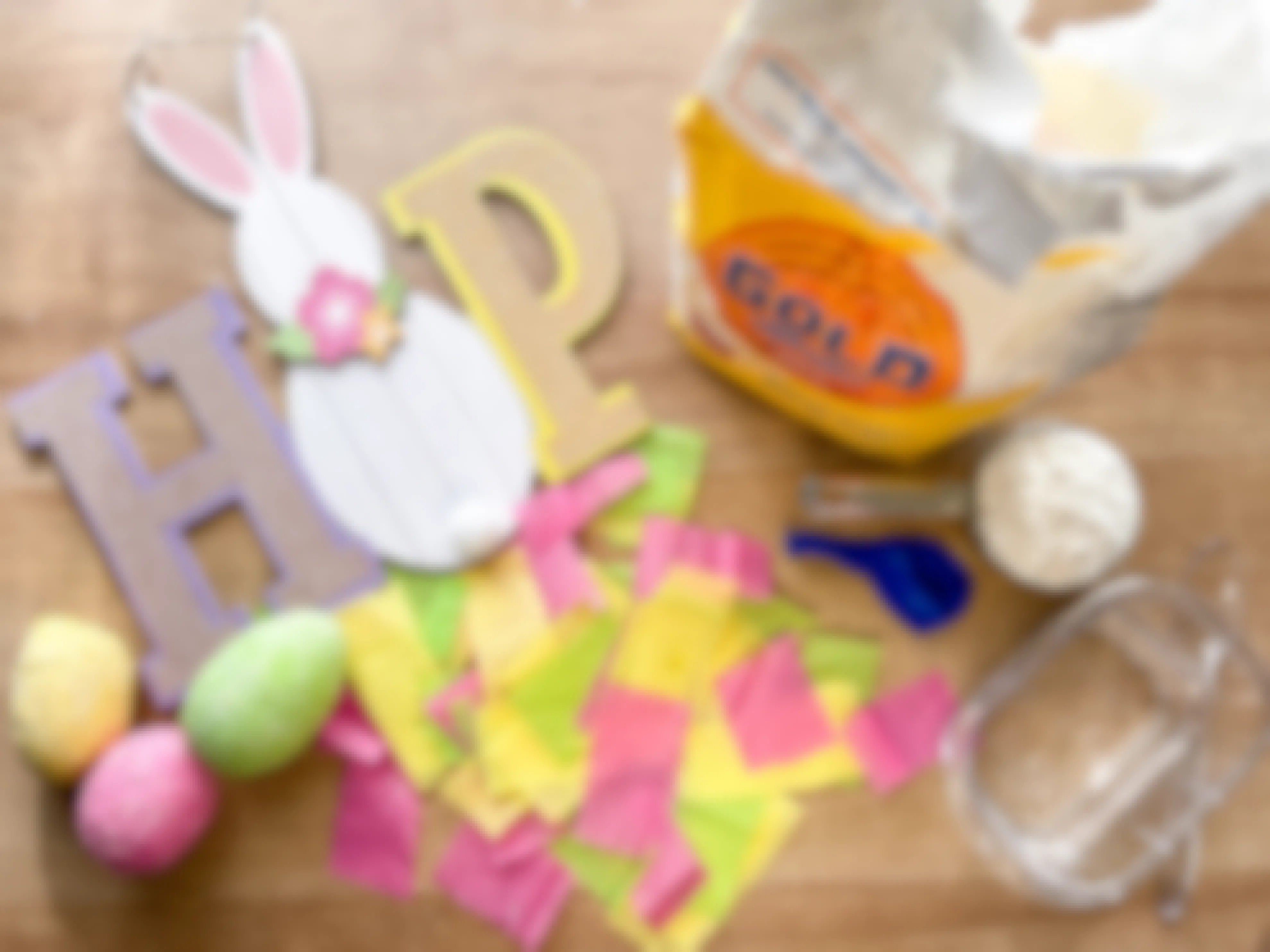 items to make paper mache easter eggs in front of easter decor 