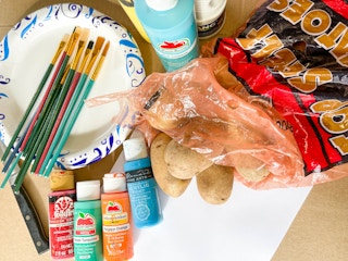 a bag of potatoes being prepared to paint