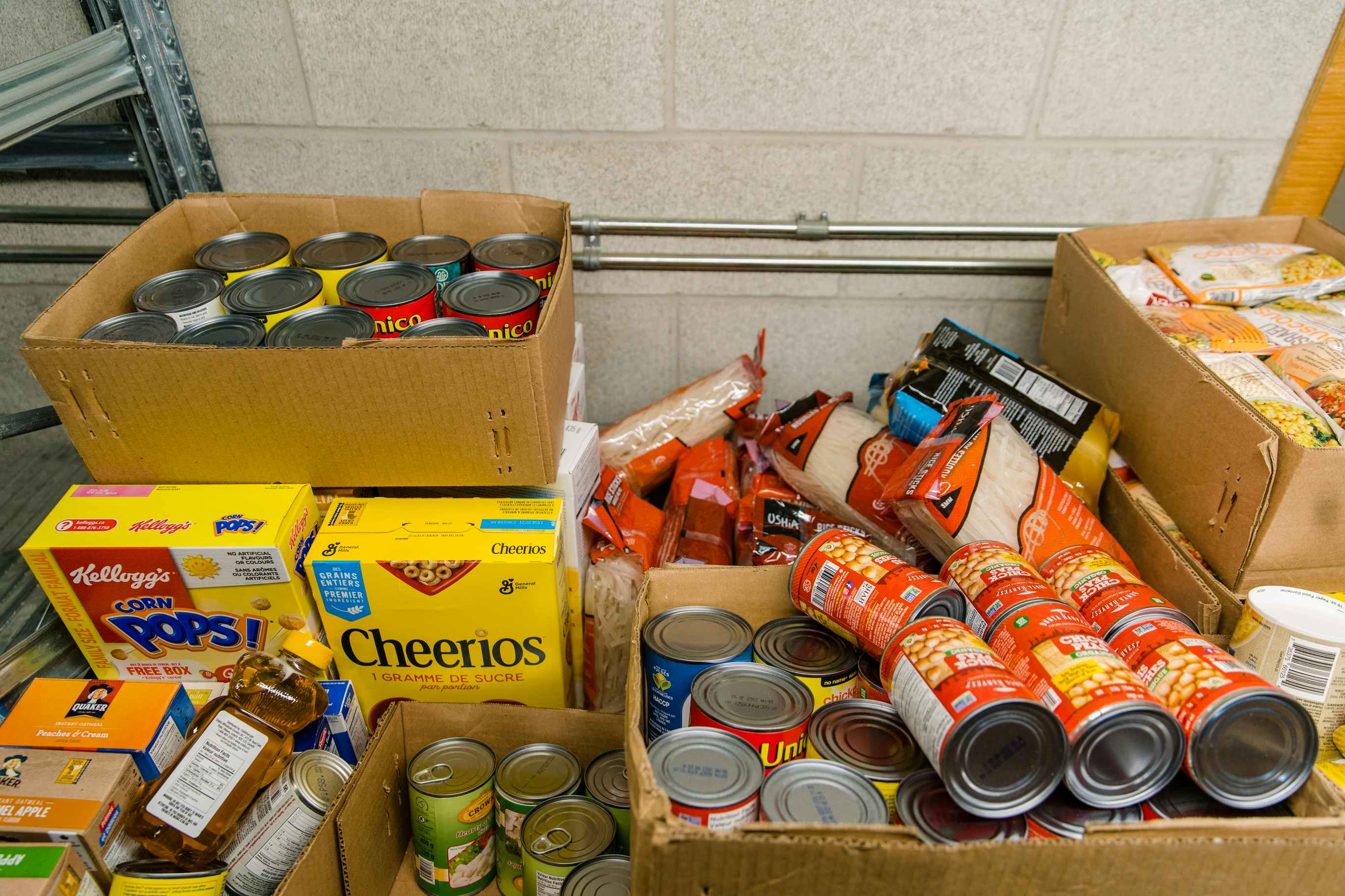 Food bank donations with boxes of shelf-stable foods