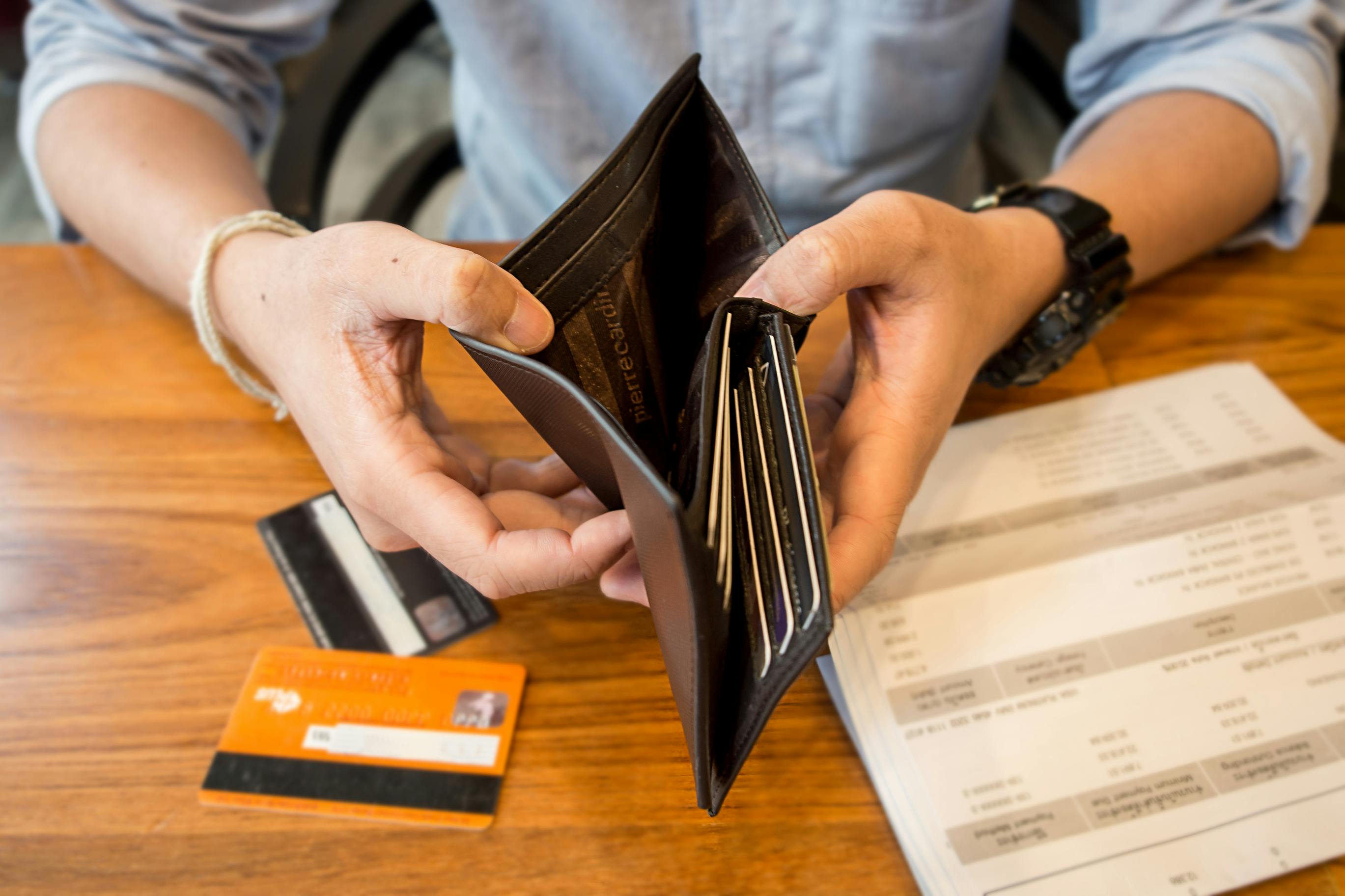 Person opening their wallet