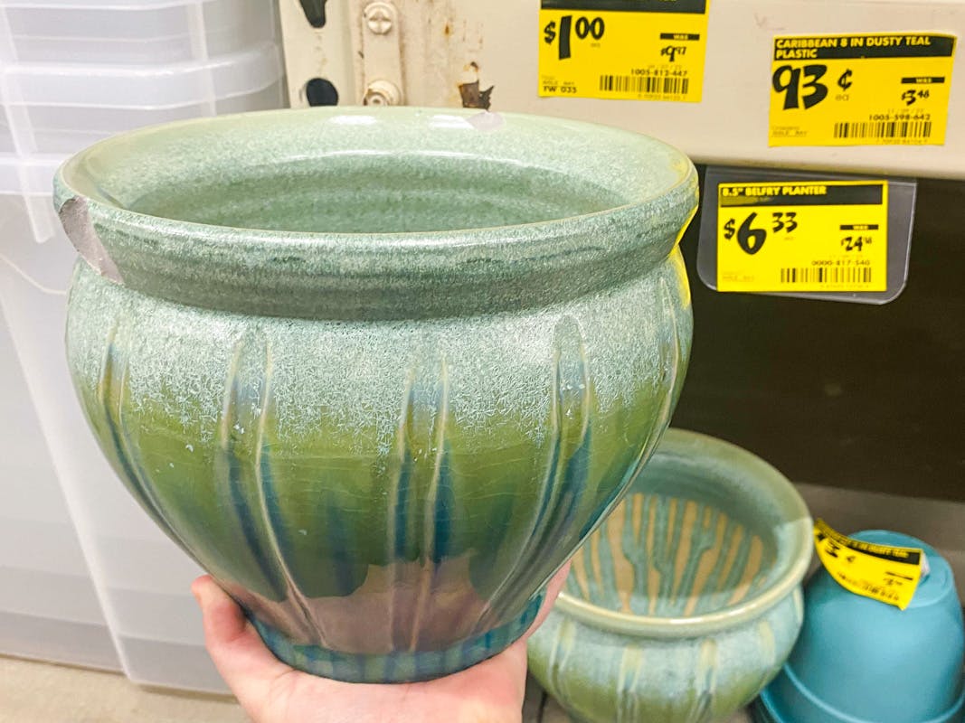 Large green outdoor planters at the garden center at home depot