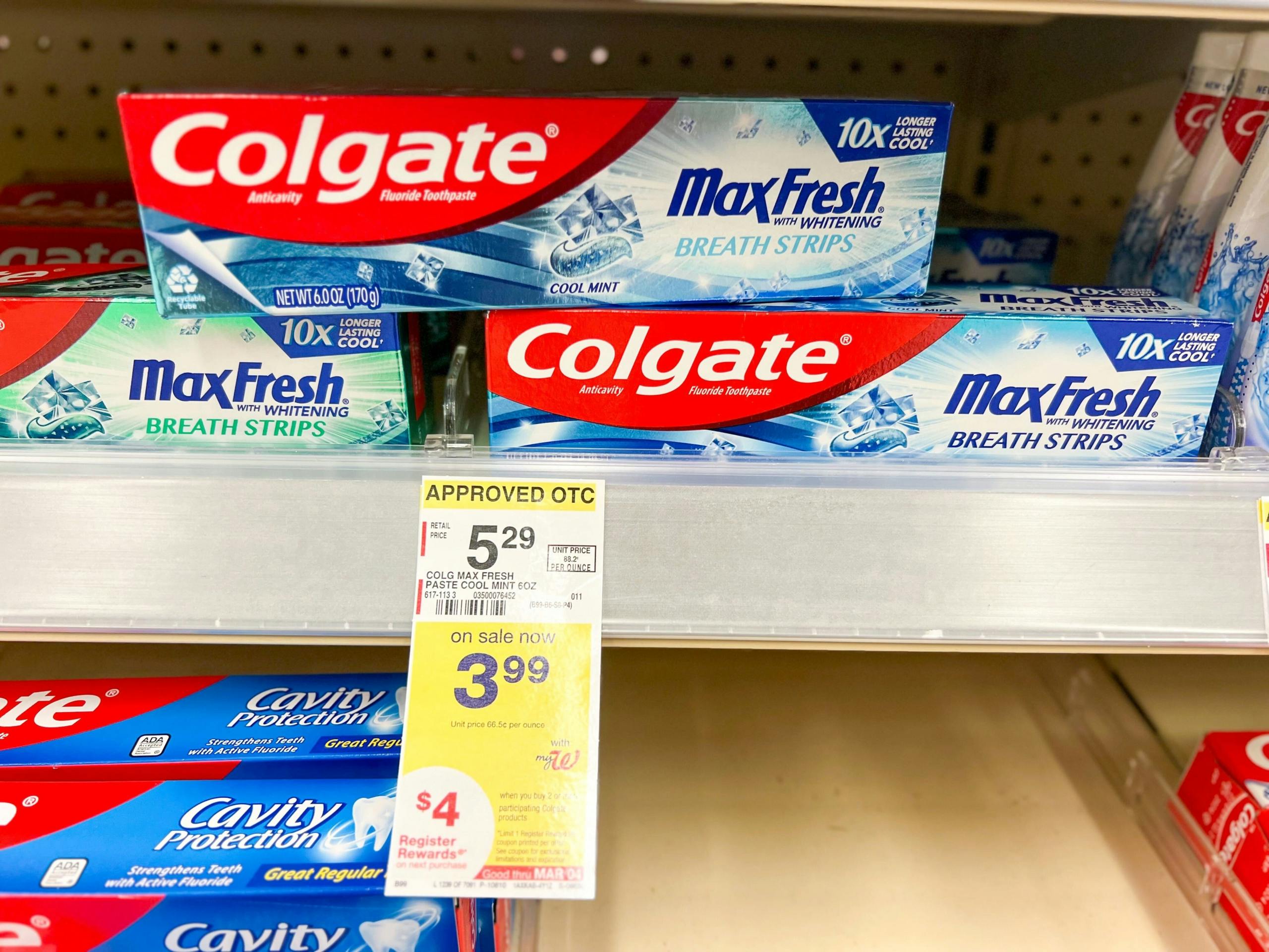 colgate toothpaste on shelf with price tag