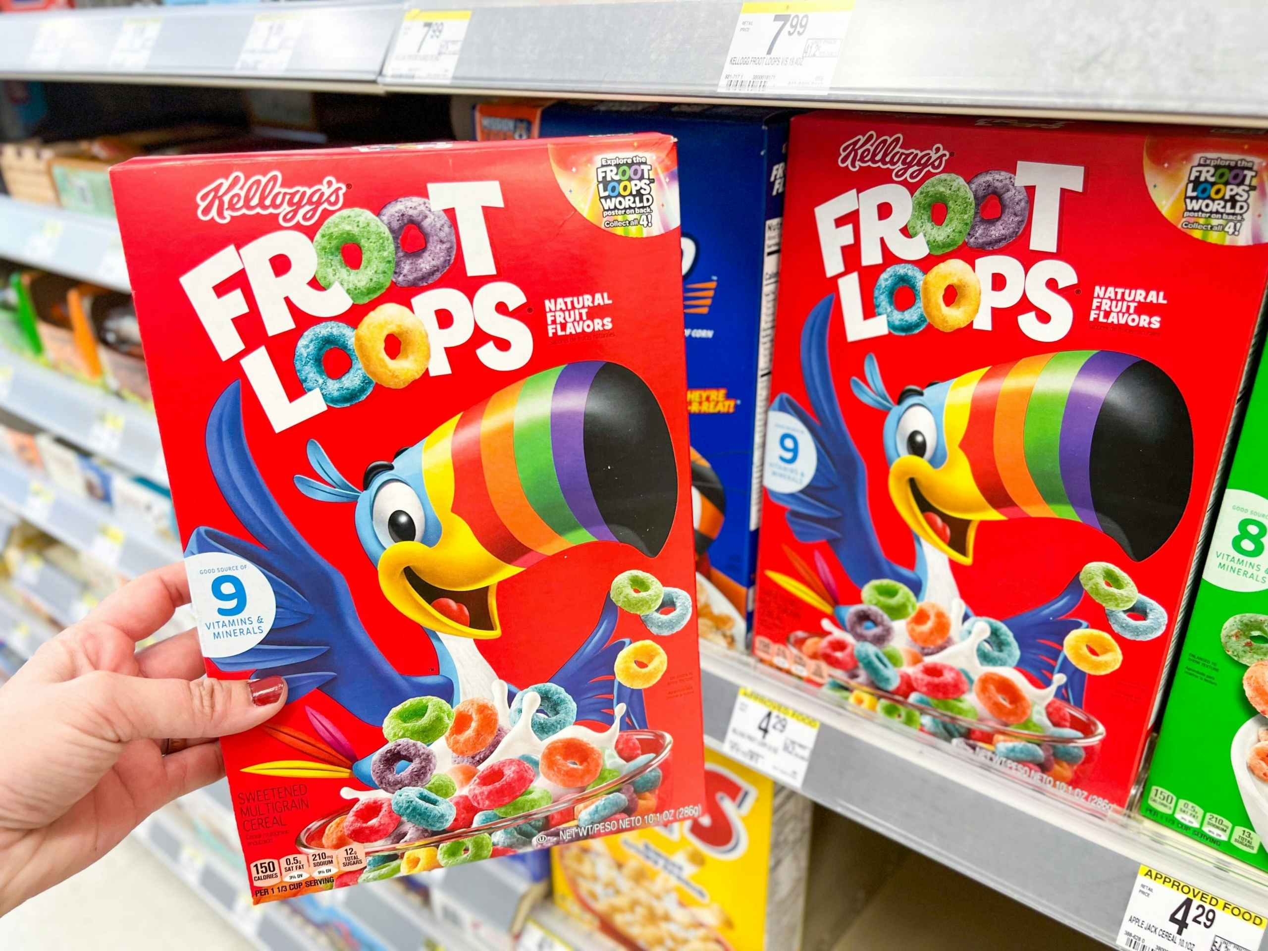 hand holding froot loops box