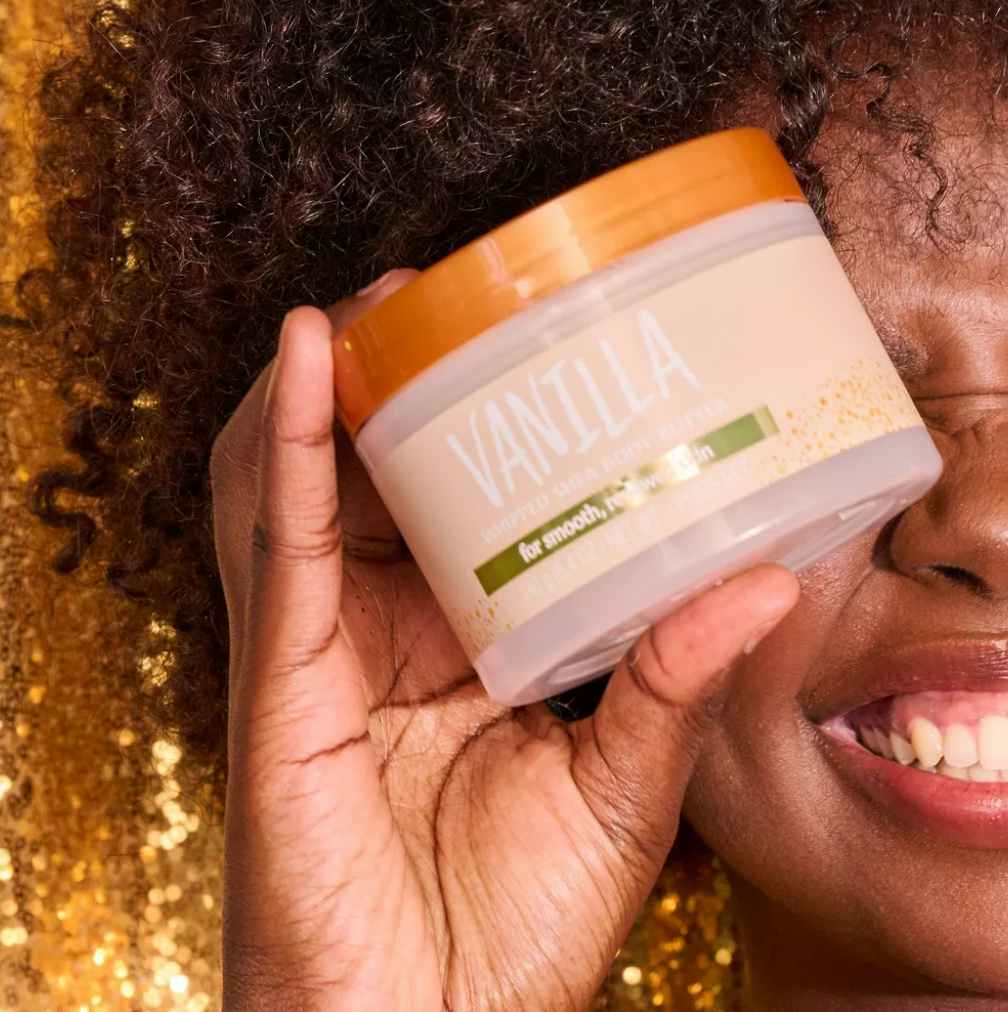 person holding vanilla tree hut whipped shea body butter