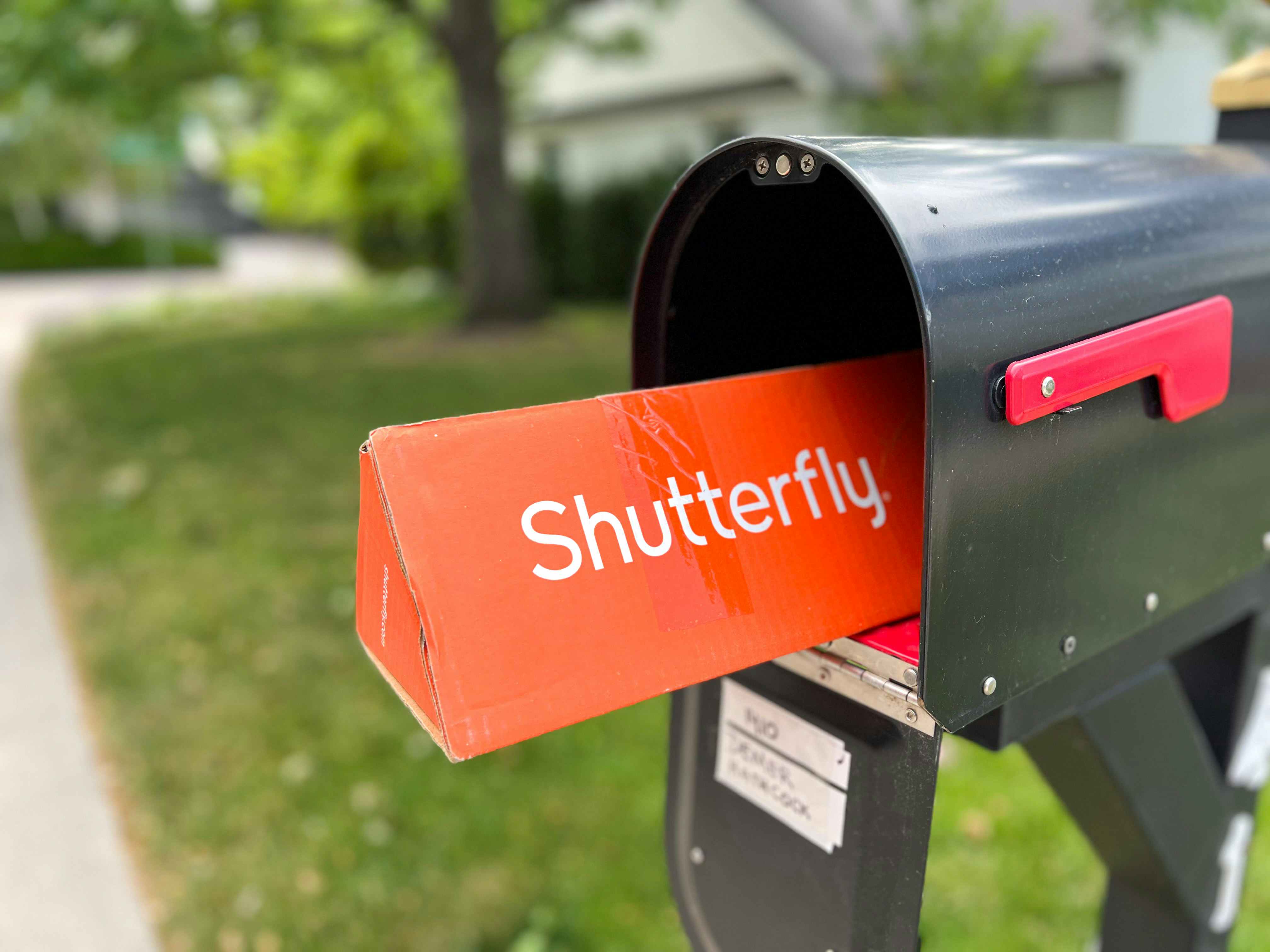shutterfly package in an open mailbox