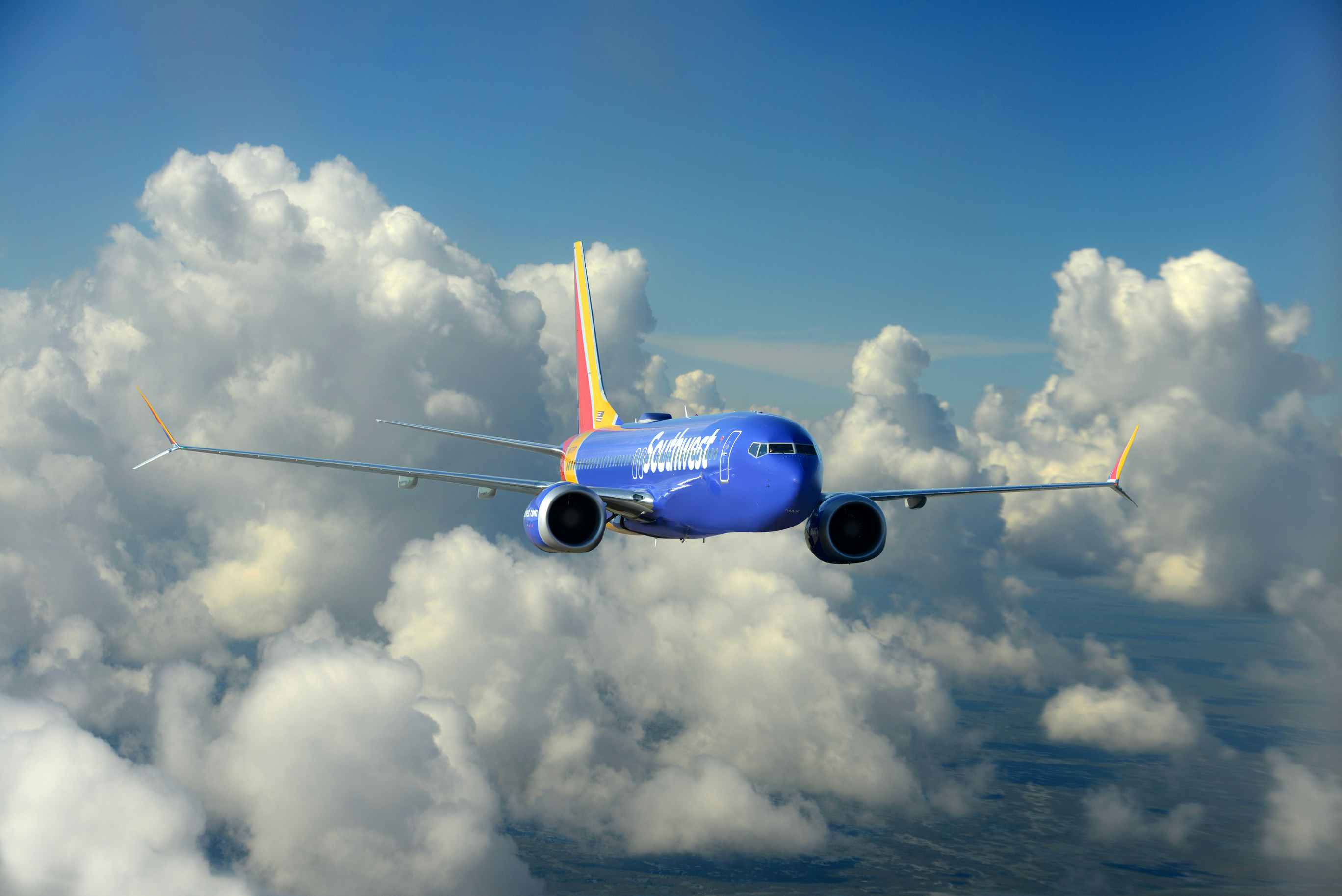 Southwest airplane flying though the clouds