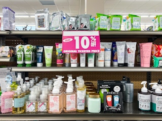 Products on shelves at a Tuesday Morning store with a 10% off sale sign on shelves at a Tuesday Morning store with a 10% off sale sign