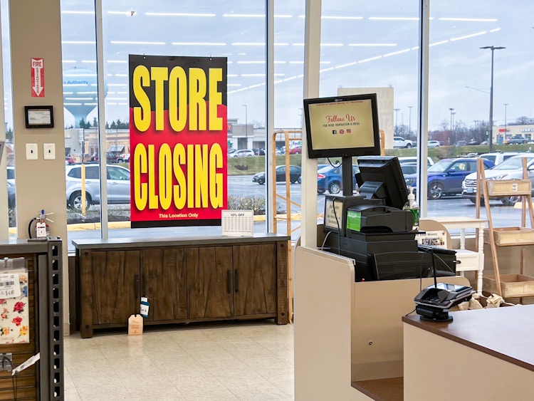A store closing sign inside a Tuesday Morning store 