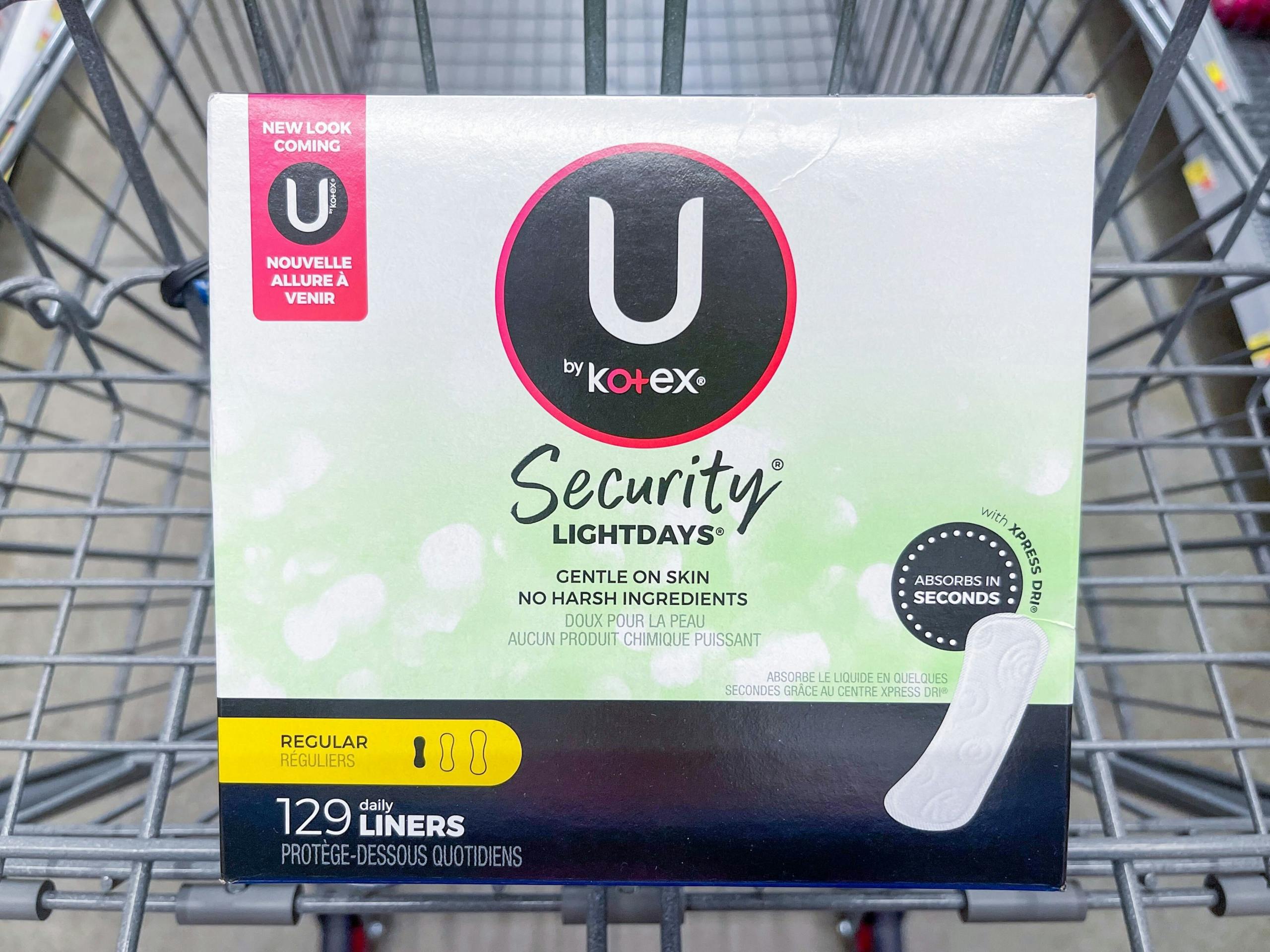 A U by Kotex Security light days liners box sitting in a store cart.