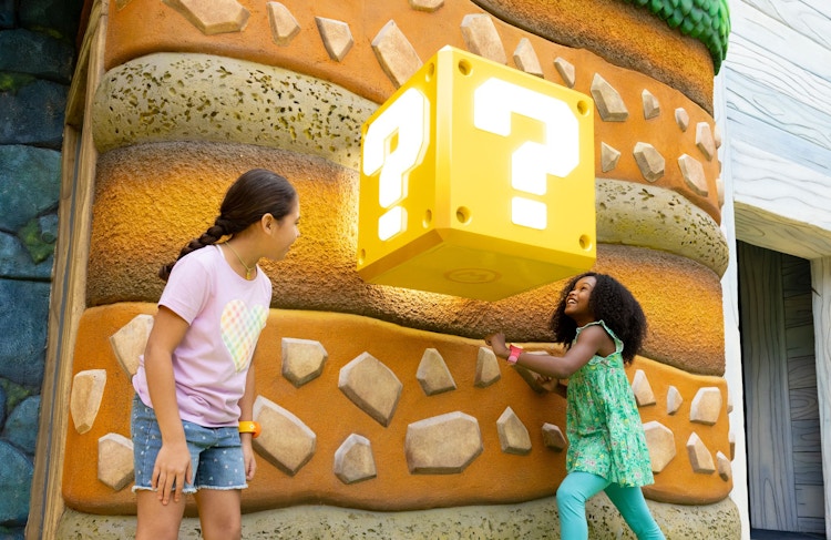 kids playing at super nintendo world at universal studios hollywood